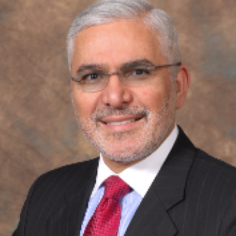A close-up portrait picture of Henry Nasrallah, MD